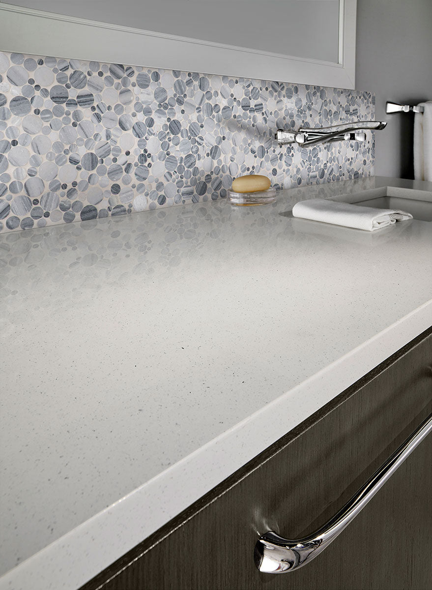 Rio Lago Alaska Gray — supplier room illustration; pebble surface shown with other materials (SMOT-PEB-ALGRY)