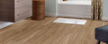 Aspenwood Wood-Look Porcelain Tile — installed room view — color Amber