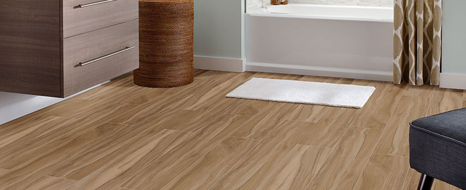 Aspenwood Wood-Look Porcelain Tile — installed room view — color Amber