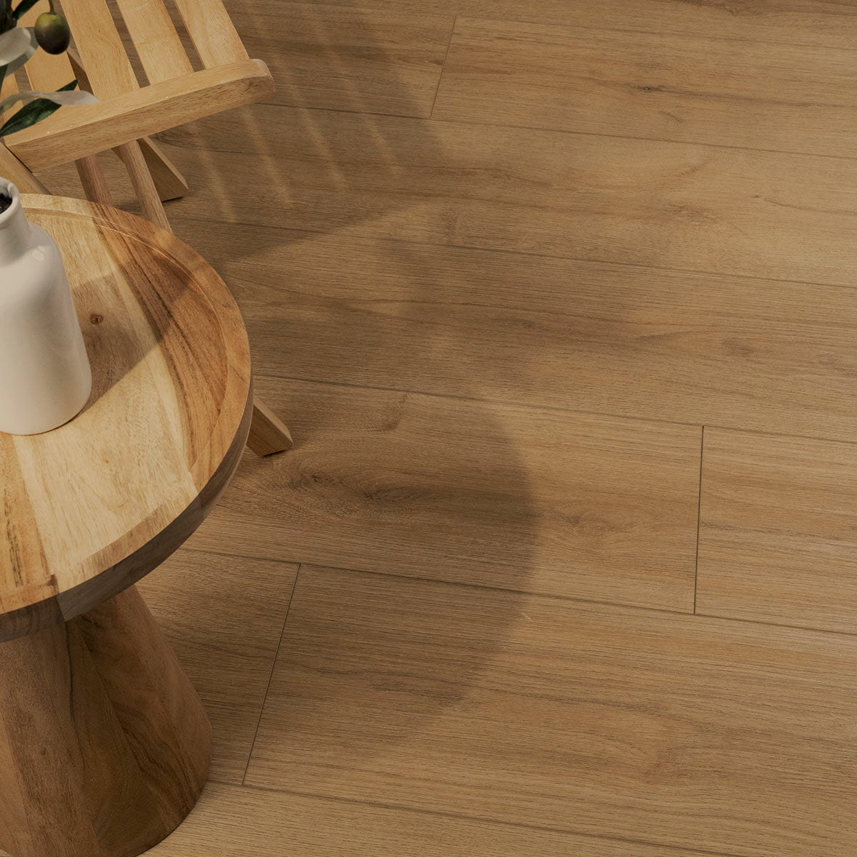 XL Prescott 9x60 Waterproof Rigid-Core Luxury Vinyl Plank — installed room view — color Amber Forrester
