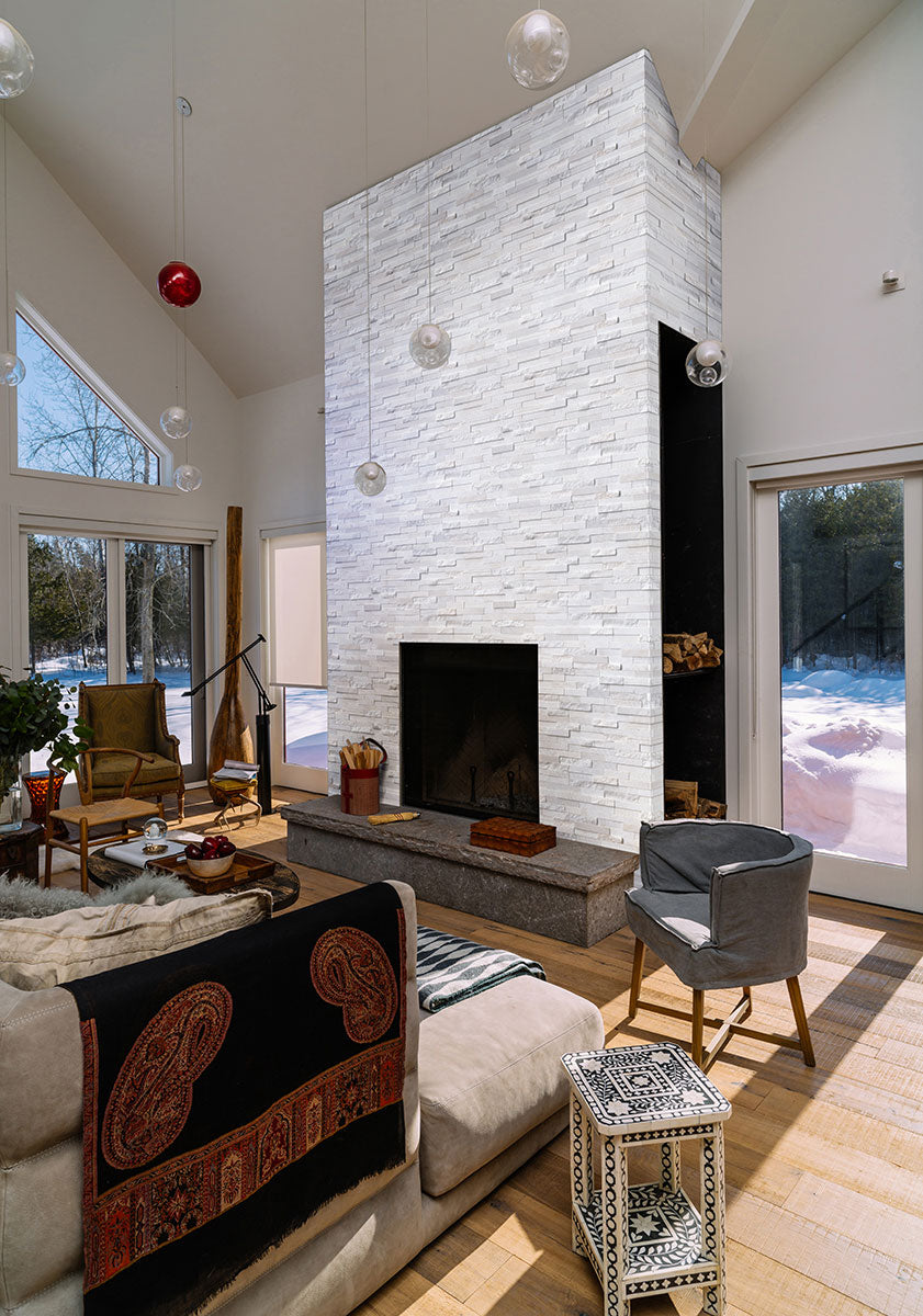 Rockmount Natural-Stone Stacked Stone Panel — installed room view — color Arctic White Multi Finish Panel