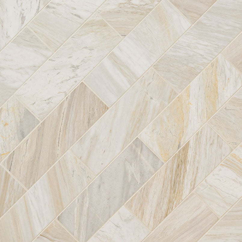 Athena Gold 4x12 Honed Marble Tile — isometric scale view — color Warm white, cream, soft gray and honey-gold, size 4x12