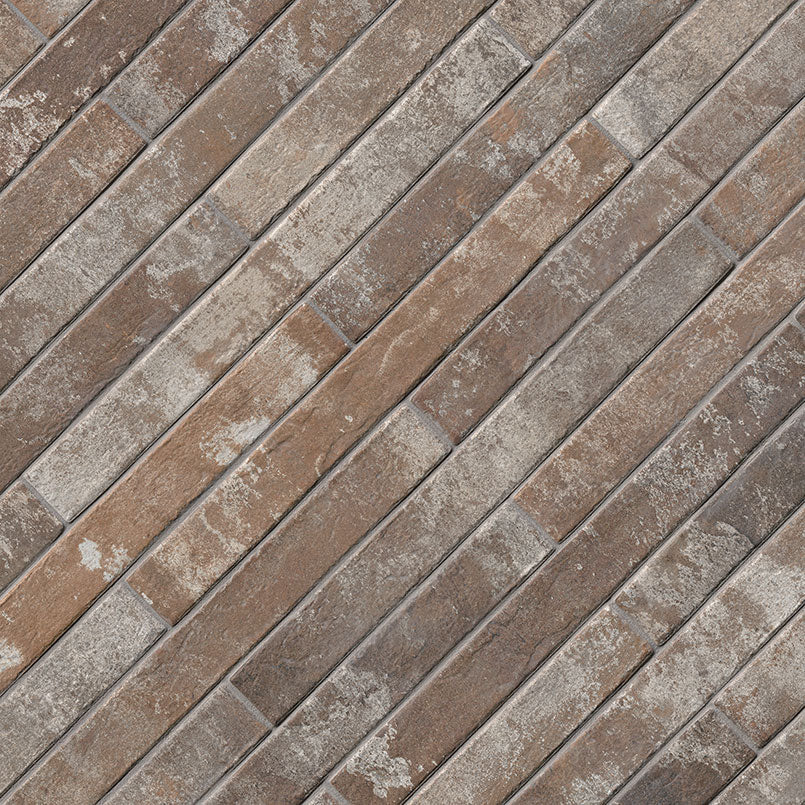 Brickstone Rustique Red 2x18 — angled surface view; illustration, not a measured scale reference (NCAPRUSREDBRI2X18)