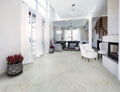 Kaya 3x24 Porcelain Bullnose — installed room view — color Carrara Bianco