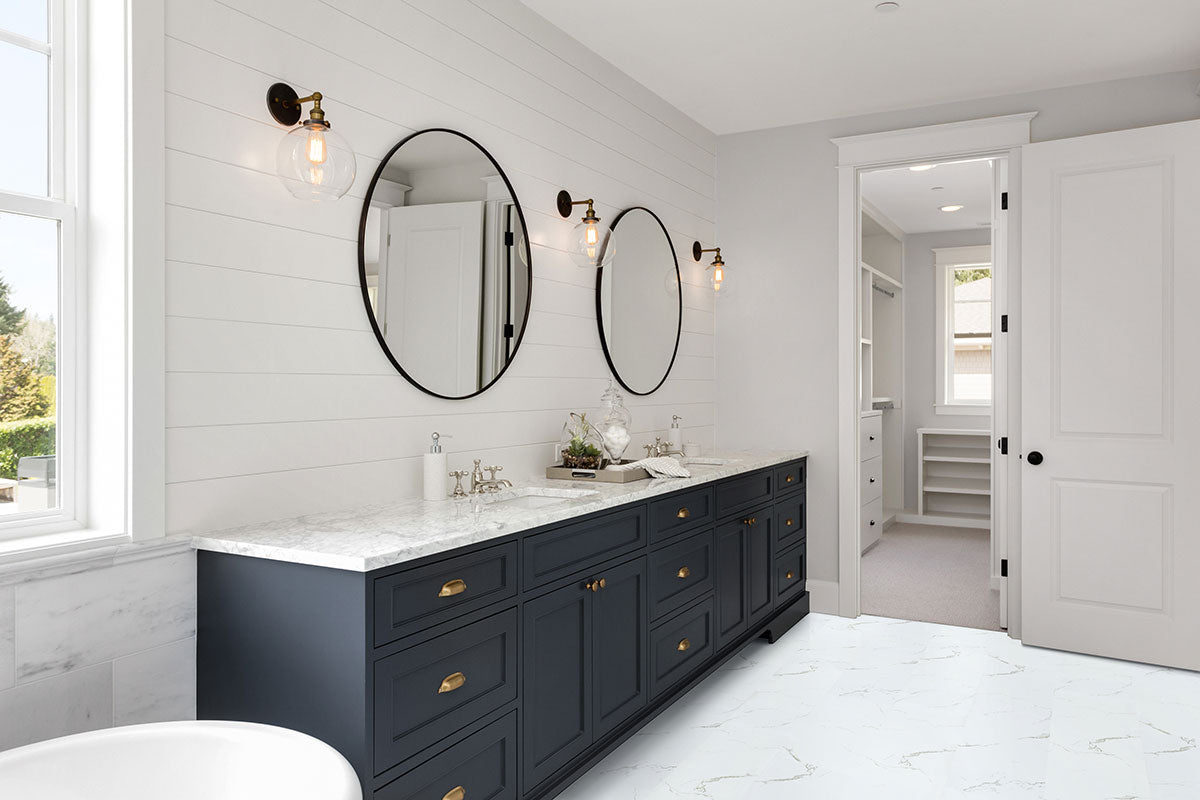 Trecento 12x24 5mm Stone-Look Rigid-Core Luxury Vinyl Tile — installed room view — color Calacatta Serra