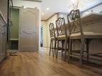 Palmetto 6x36 Matte Wood-Look Porcelain Tile — installed room view — color Cognac