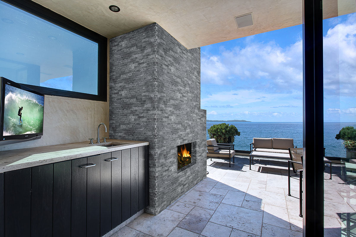 Rockmount Natural-Stone Stacked Stone Corner — installed room view — color Cosmic Black Split Face