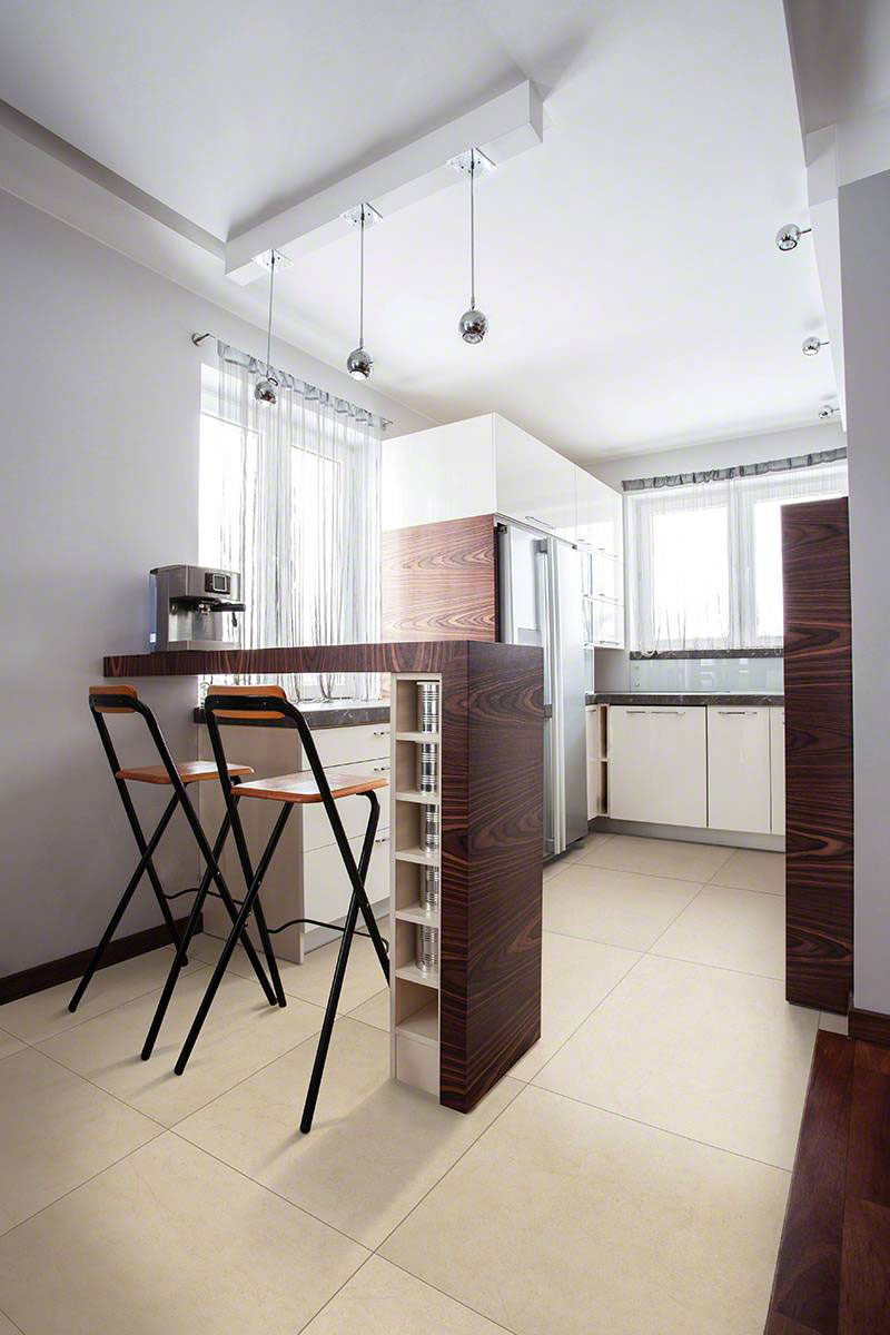 Aria Polished Porcelain Tile — installed room view — color Cremita