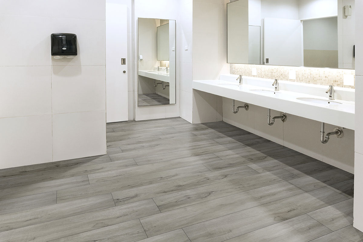 XL Cyrus 9x60 Waterproof Rigid-Core Luxury Vinyl Plank — installed room view — color Dunite Oak
