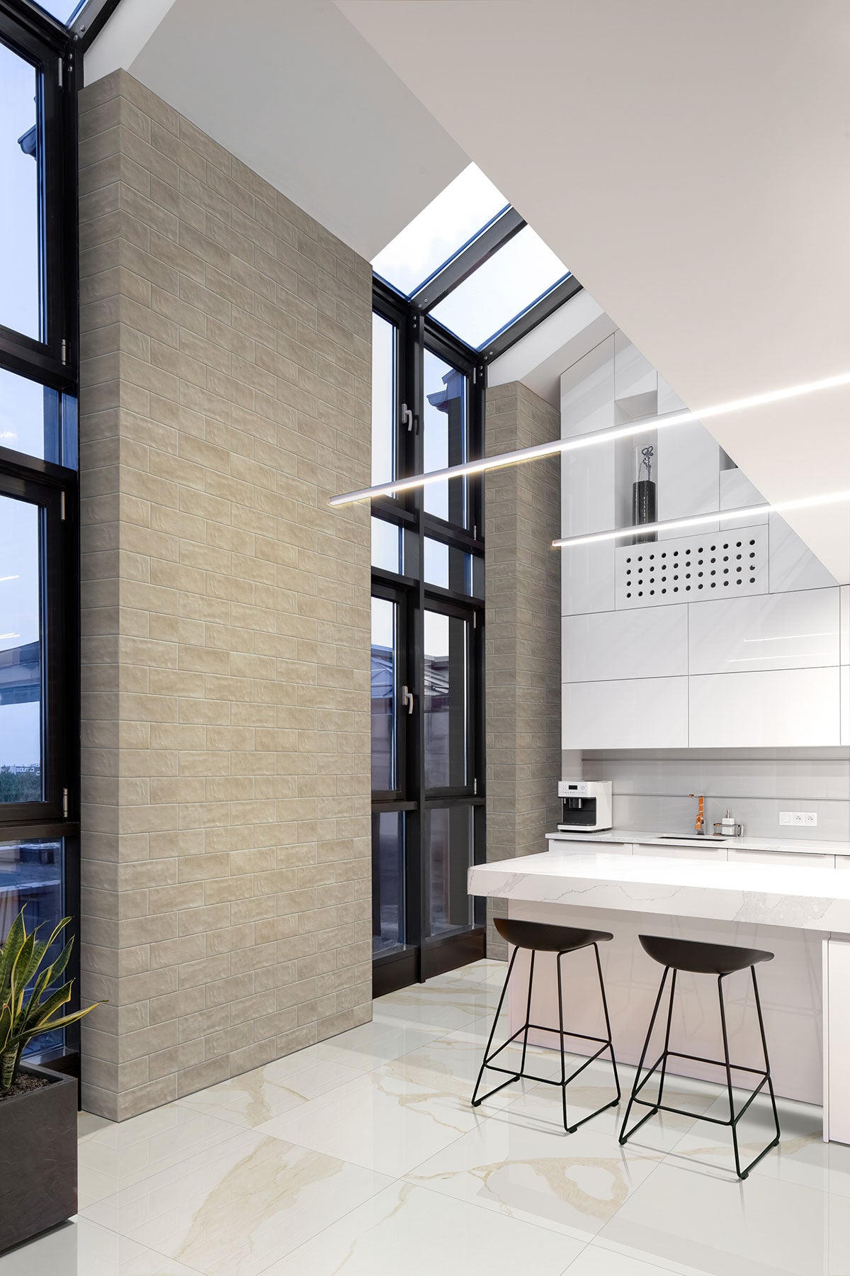 Eden Chevron Matte Porcelain Mosaic — installed room view — color Calacatta