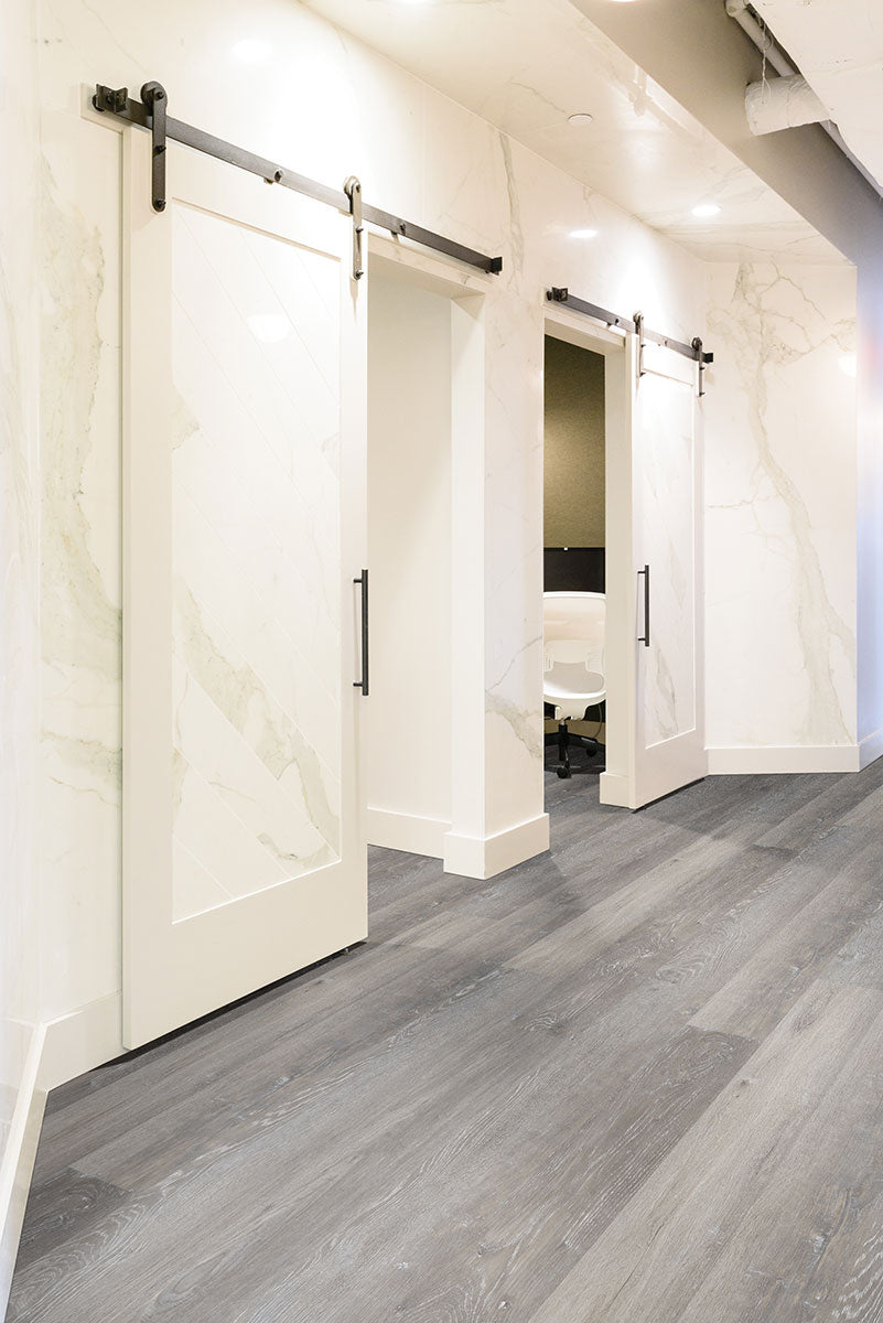 Glenridge 6x48 2mm 12mil Glue-Down Luxury Vinyl Plank — installed room view — color Elmwood Ash