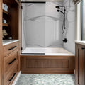 Montblanc Statuario AquaLume Polished Porcelain Tub and Shower Panel Set — installed room view