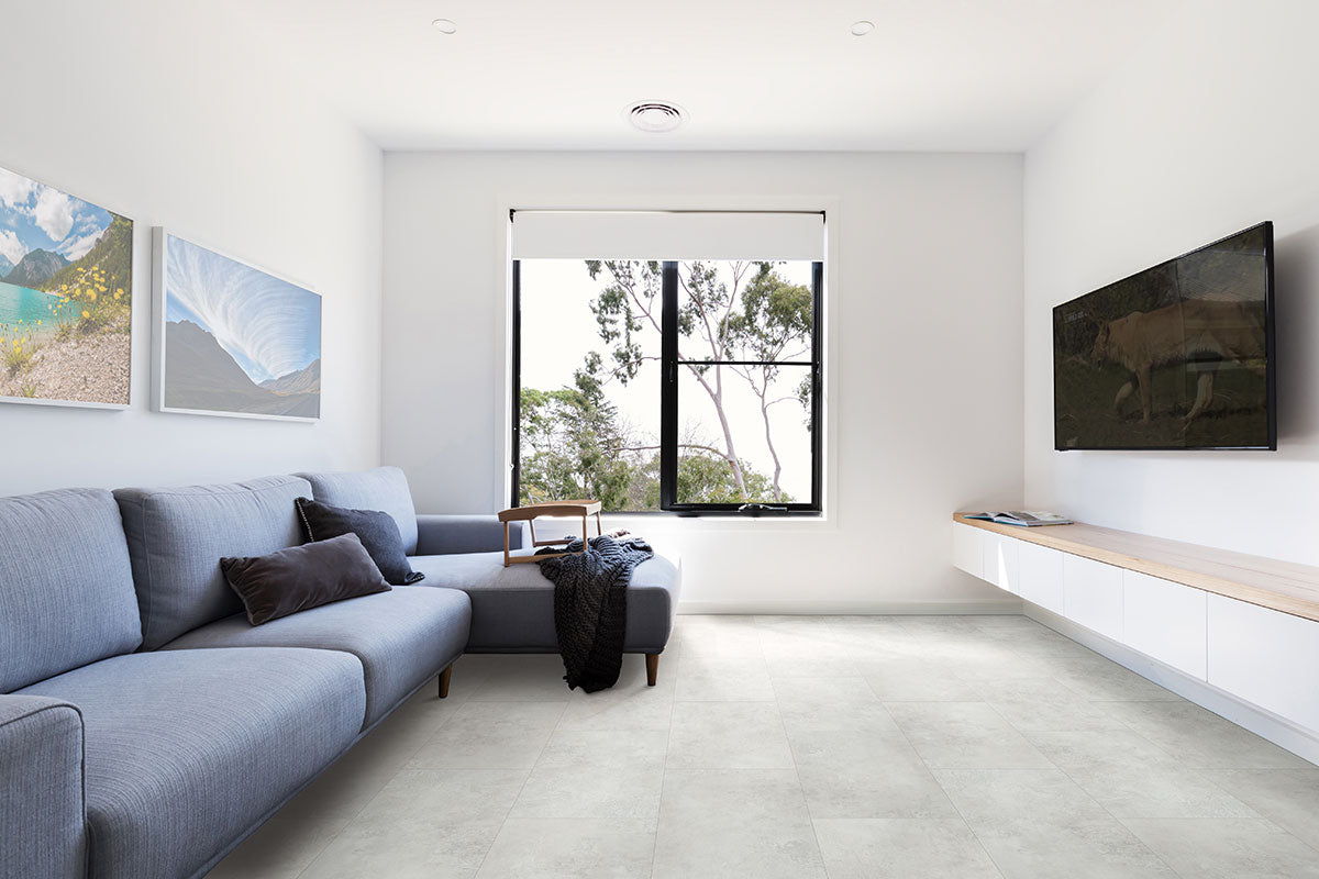 Trecento 12x24 5mm Stone-Look Rigid-Core Luxury Vinyl Tile — installed room view — color Mountains Gray