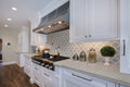 White Quarry Savona Arabesque Marble Mosaic — installed room view