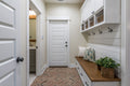 Noble Red 2.25x7.5 Tumbled Reclaimed-Clay Herringbone Mosaic — installed room view