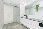 Quebec Onyx AquaLume 31.5x71 Polished Porcelain Panel Set — installed room view — color Onyx