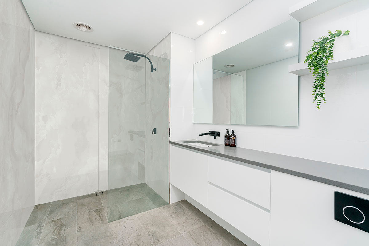Quebec Onyx AquaLume 31.5x71 Polished Porcelain Panel Set — installed room view — color Onyx