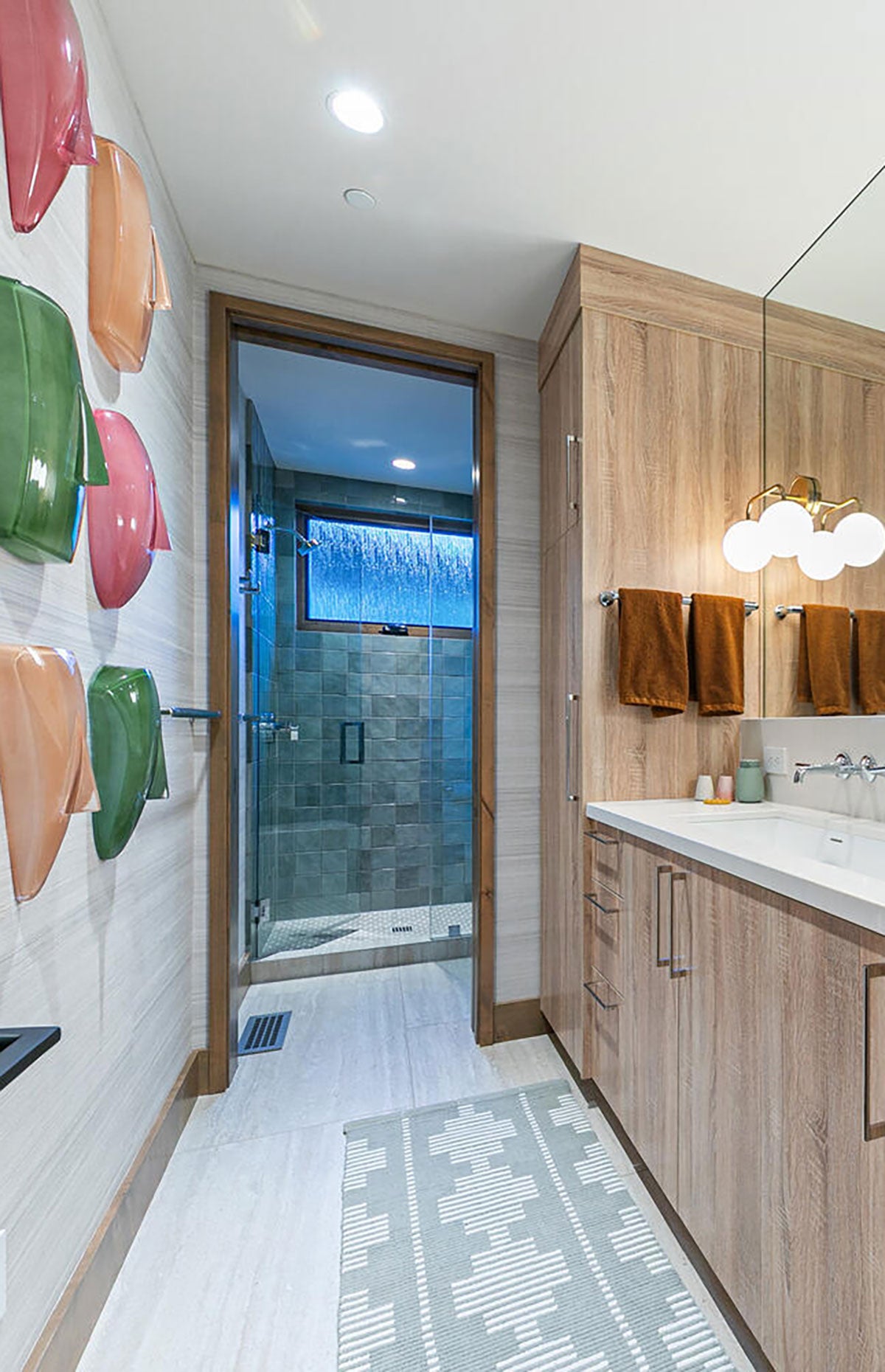 Renzo Glossy Ceramic Wall Tile — installed room view — color Jade