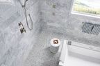 Rio Lago Natural-Stone Pebble Mosaic — installed room view — color Sliced Carrara White