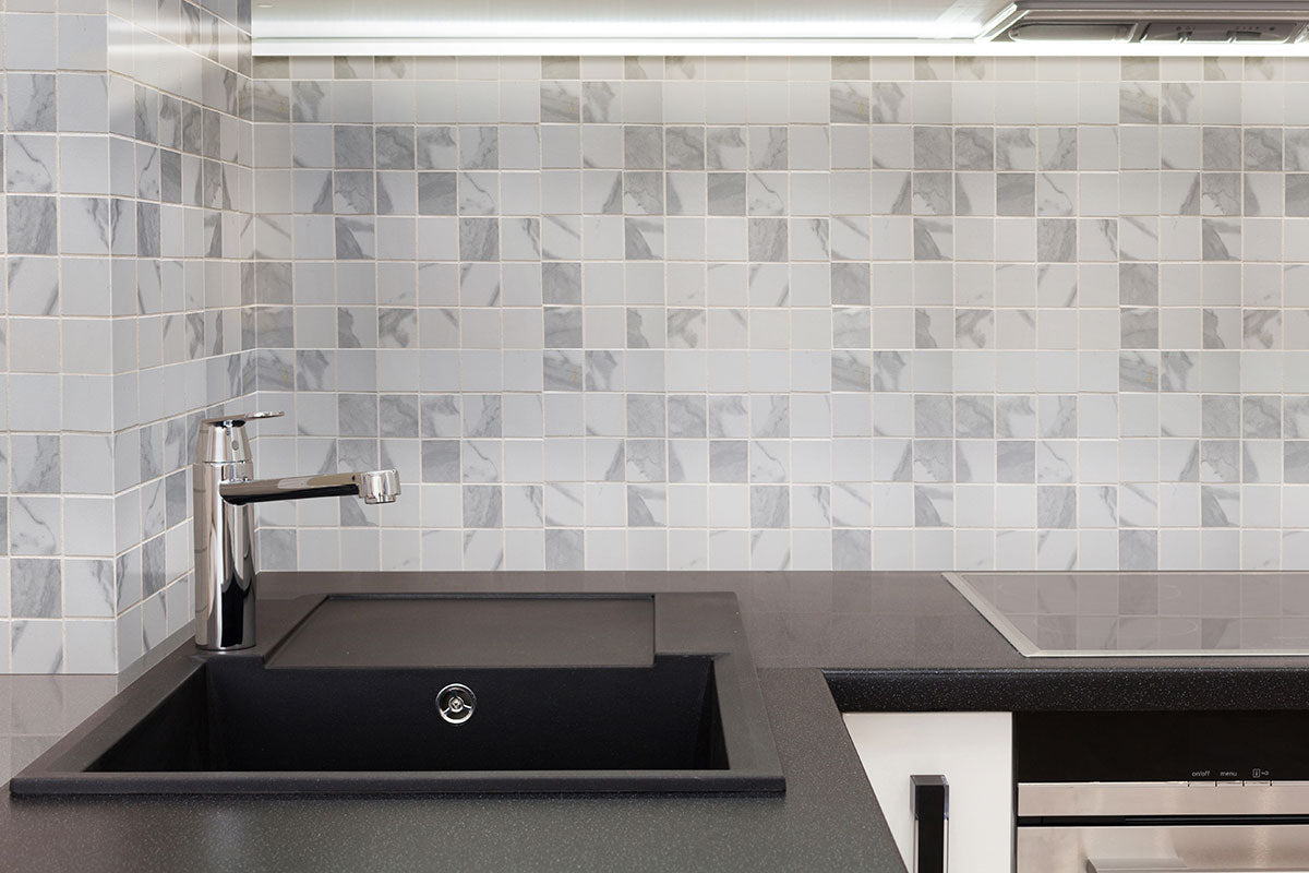 Eden 4x24 Porcelain Bullnose — installed room view — color Statuary