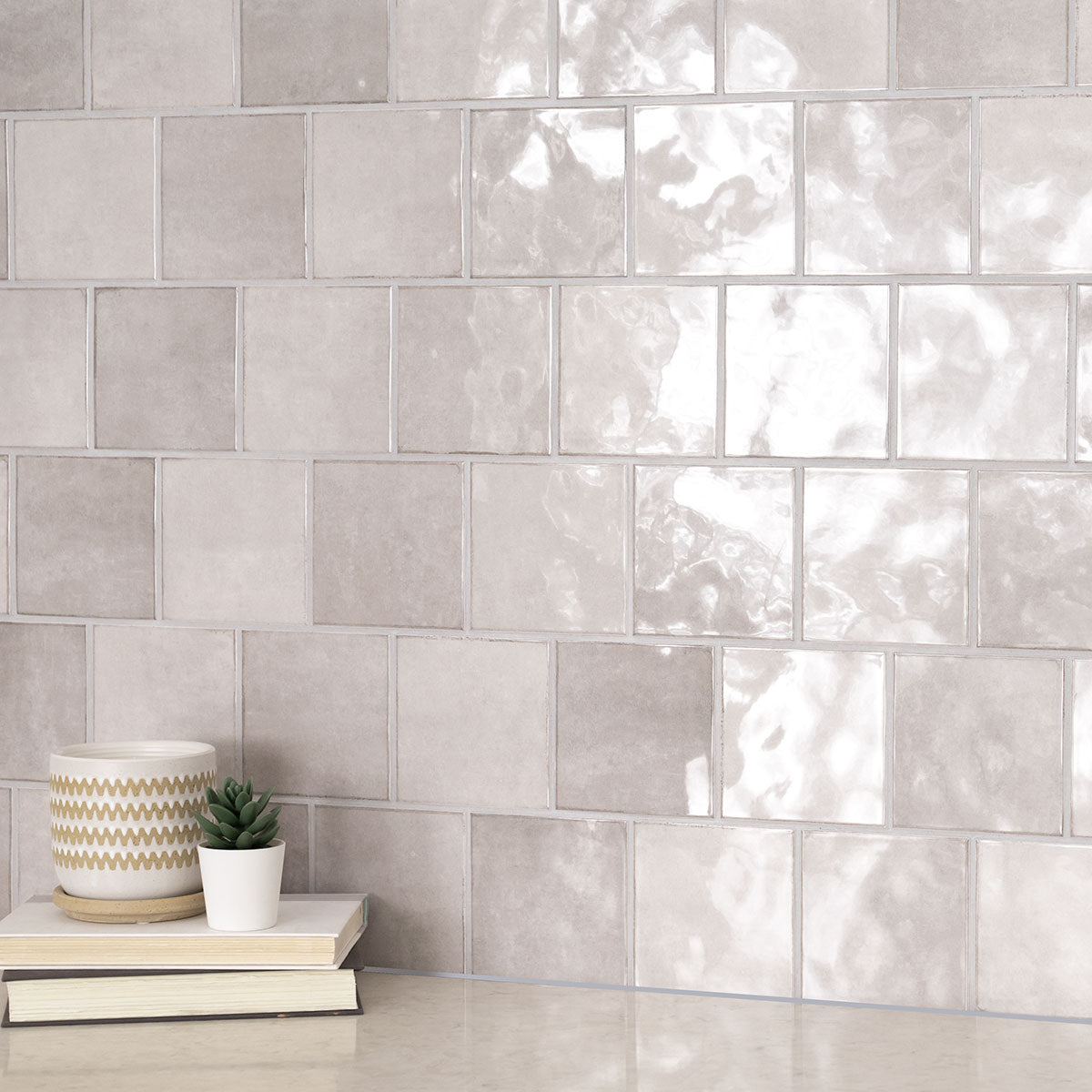 Renzo Glossy Ceramic Wall Tile — installed room view — color Sterling