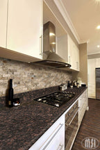 Tan Brown 12x12 Polished Granite Tile — installed room view — color Dark brown with black and gray flecks