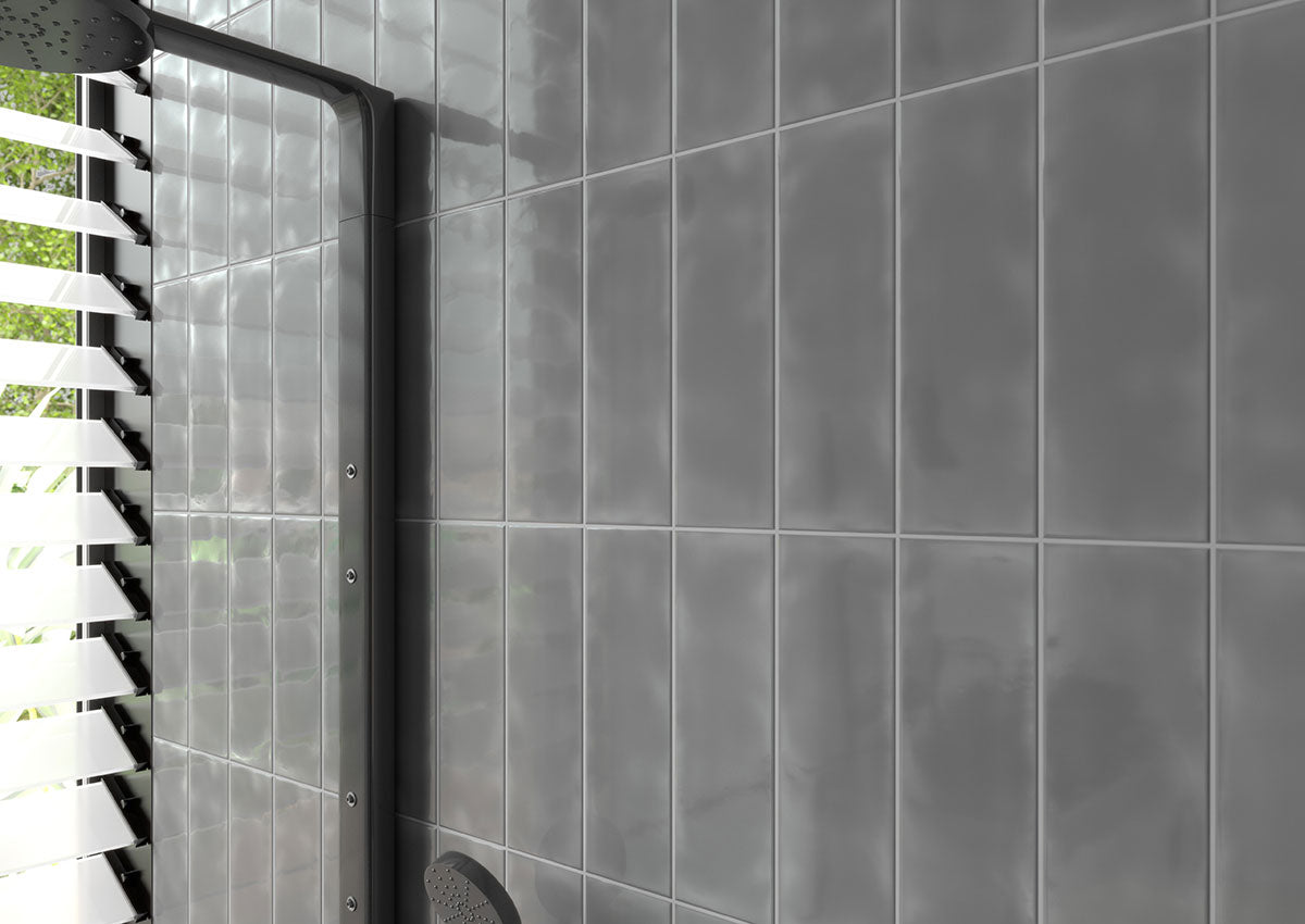 Urbano 3D Mix 4x12 Glossy Ceramic Wall Tile — installed room view — color Graphite
