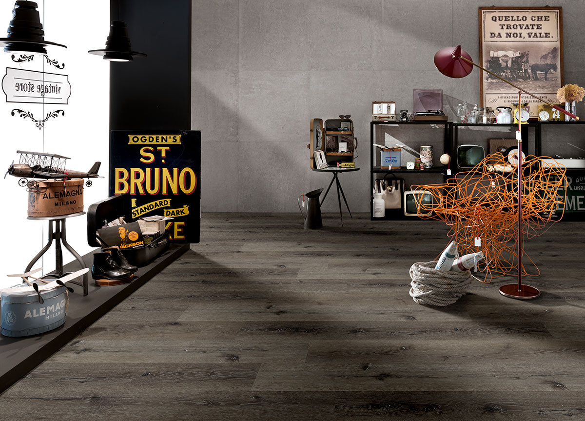 Wilmont 7x48 Glue-Down Luxury Vinyl Plank — installed room view — color Charcoal Oak