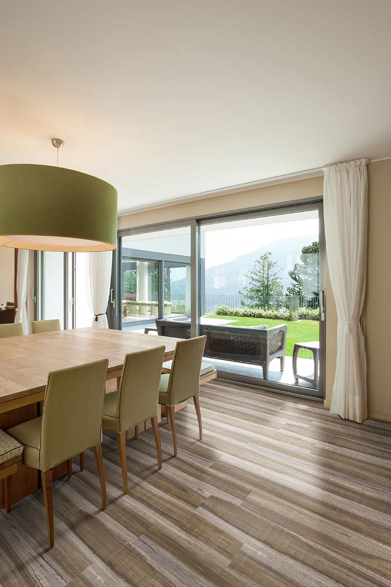 XL Cyrus 9x60 Waterproof Rigid-Core Luxury Vinyl Plank — installed room view — color Exotika